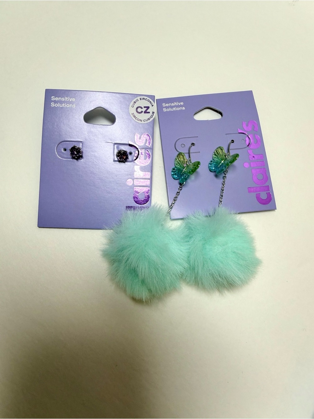 Claire's Mint Faux-Fur Pom Drop Earrings with Iridescent Butterfly Charms